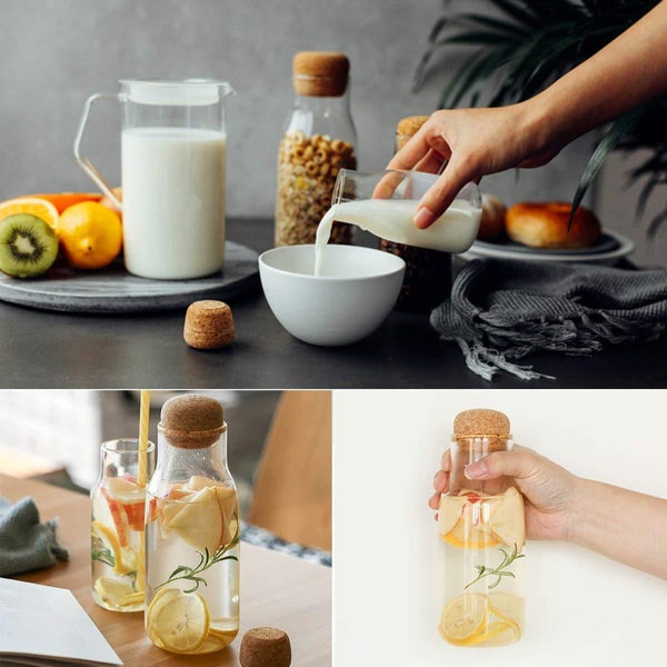 Durable borosilicate glass bottle with cork sleeve – eco-friendly water bottle and pitcher for sustainable living.
