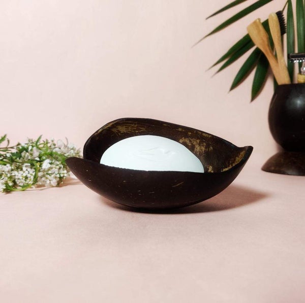 Handcrafted coconut shell soap tray – eco-friendly bathroom accessory for natural living.