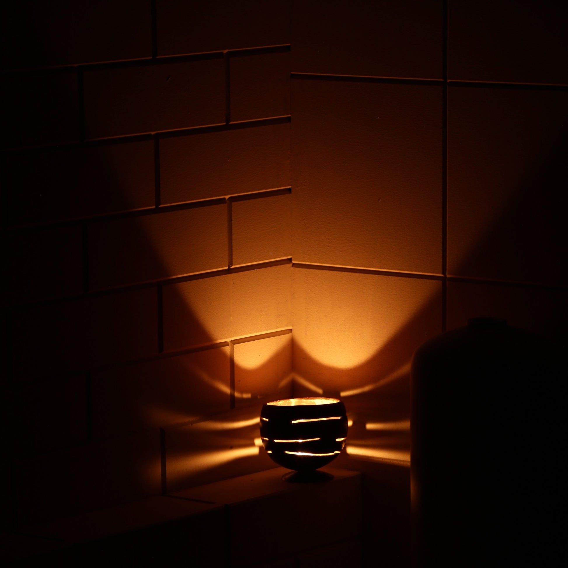 Handcrafted coconut shell tea light holder – natural festive décor for a warm eco-friendly glow.