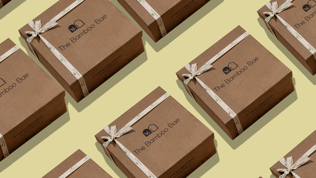 Bulk eco-friendly Diwali gift hampers for employees stacked with branded sleeves.