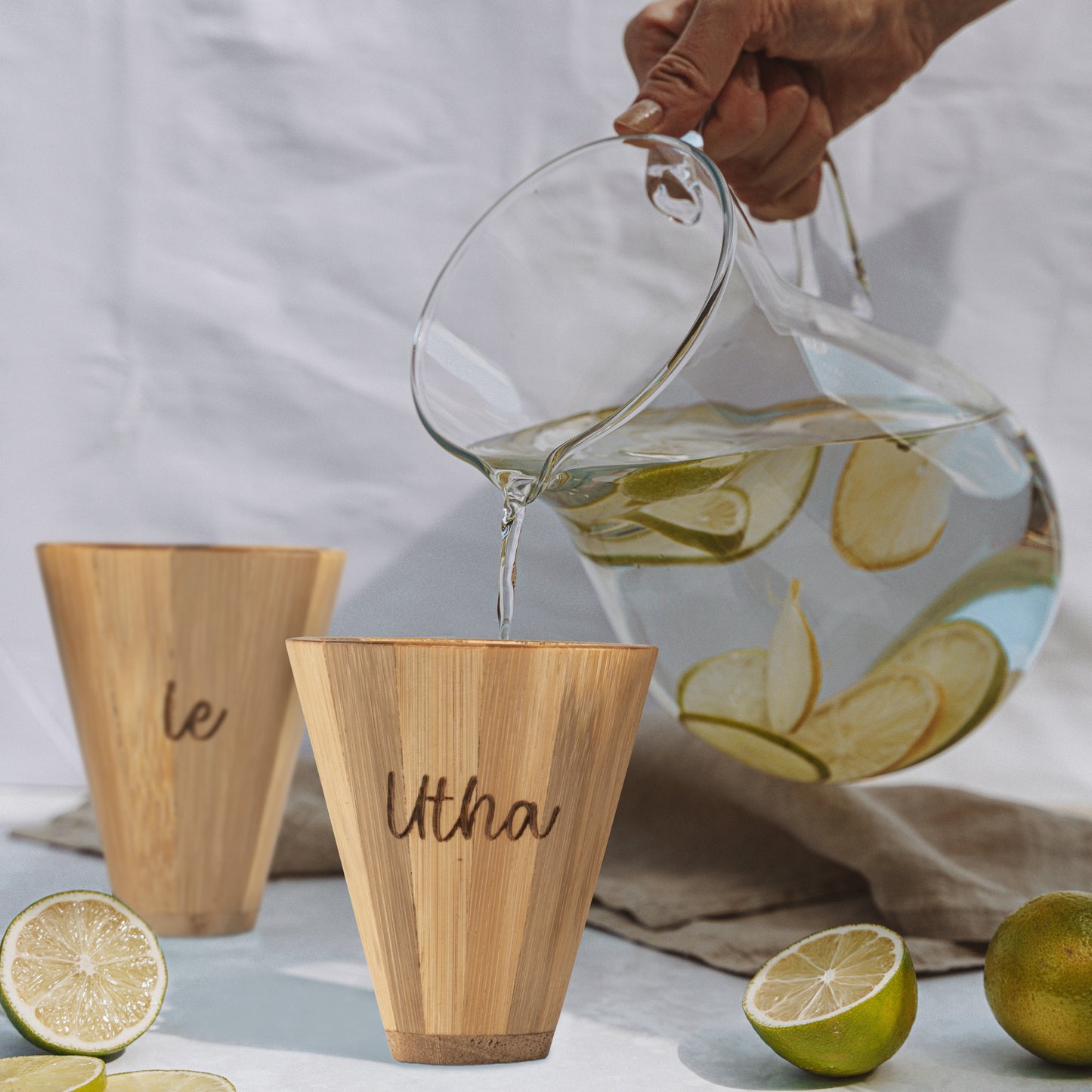Set of 2 eco-friendly bamboo shot glasses – sustainable reusable drinkware for parties and gifting.