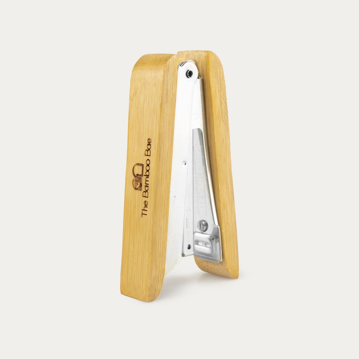 Eco-friendly bamboo stapler – sustainable office stationery for everyday use.
