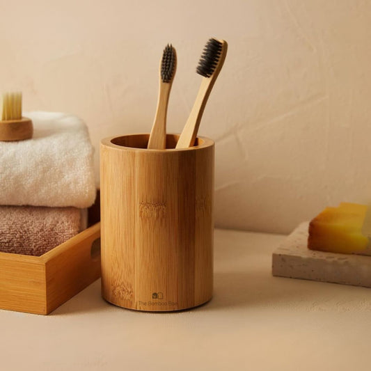 Eco-friendly bamboo toothbrush holder stand – round bathroom holder for toothbrushes, pens, or kitchen tools.
