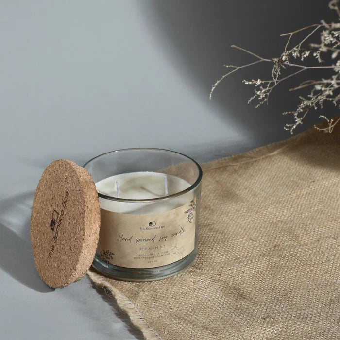 Soy wax candle in reusable glass jar with cork lid – eco-friendly, clean-burning, and perfect for gifting.