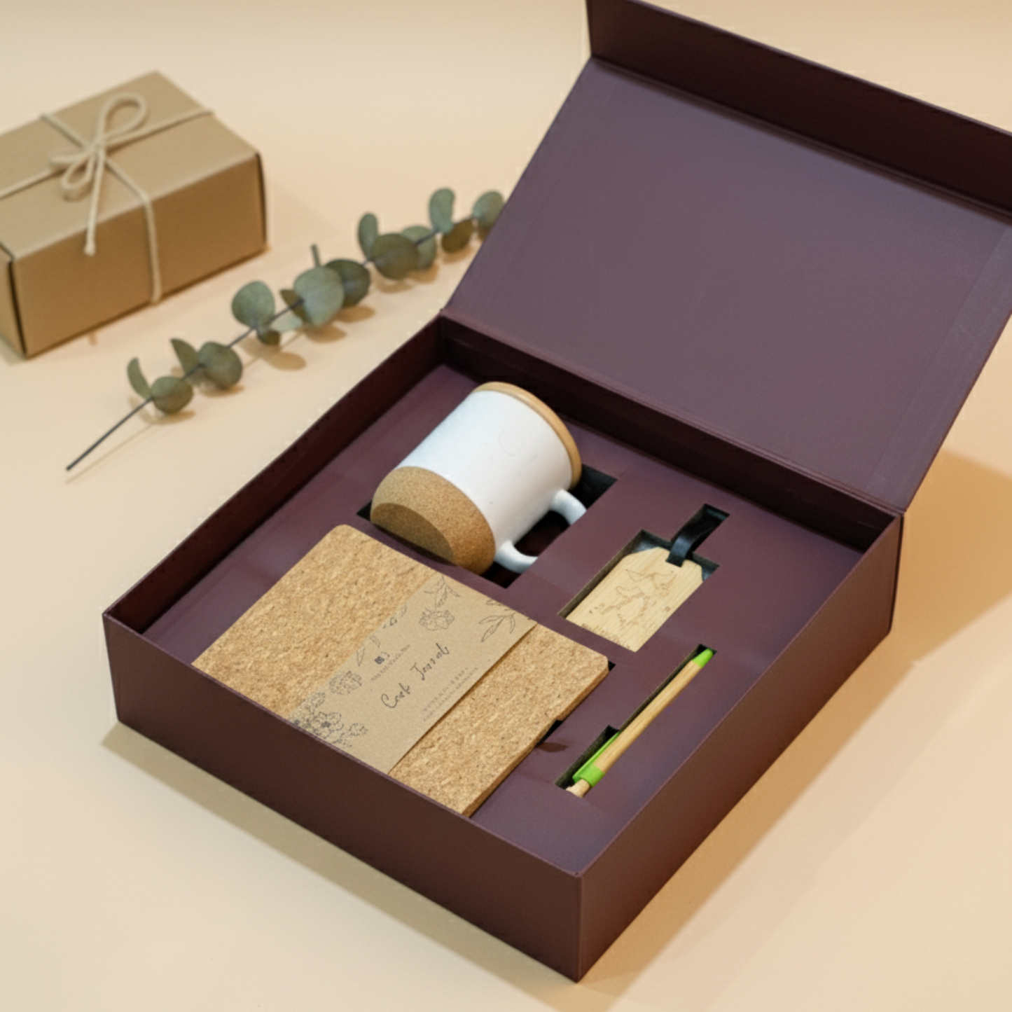 Sustainable gift hamper with cork diary, ceramic mug with cork base, bamboo pen, and wooden travel tag – perfect for corporate gifting.