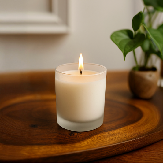 Eco-friendly soy wax candle in reusable frosted glass jar – clean burning sustainable home décor and gifting option.