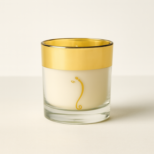 Soy wax Diwali candle in golden glass jar with Ganesh Ji design – eco-friendly festive décor and gifting option.