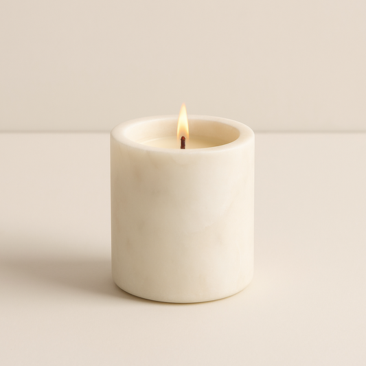 Eco-friendly soy wax candle in reusable marble jar – minimalist luxury décor and sustainable gifting option.