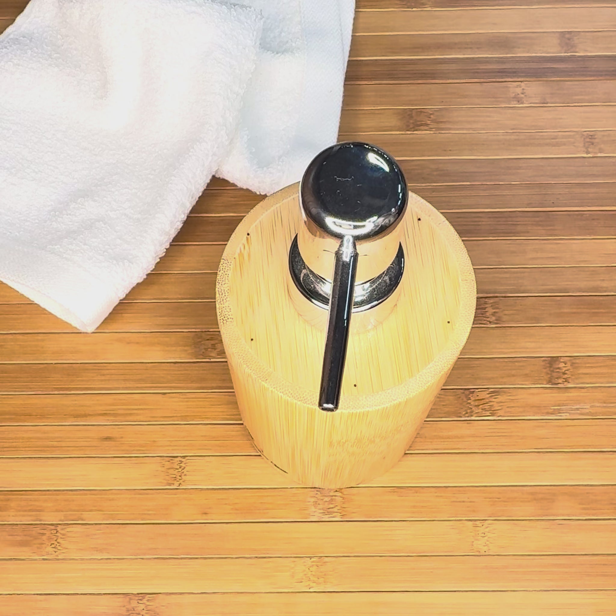 Eco-friendly bamboo soap dispenser – refillable container for liquid soap, lotion, sanitizer, or shower gel.