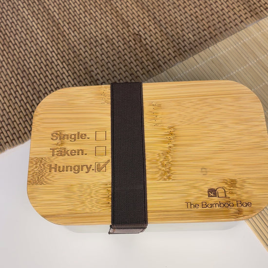 Eco-friendly bamboo lunch box – reusable wooden bento tiffin for meals and snacks.