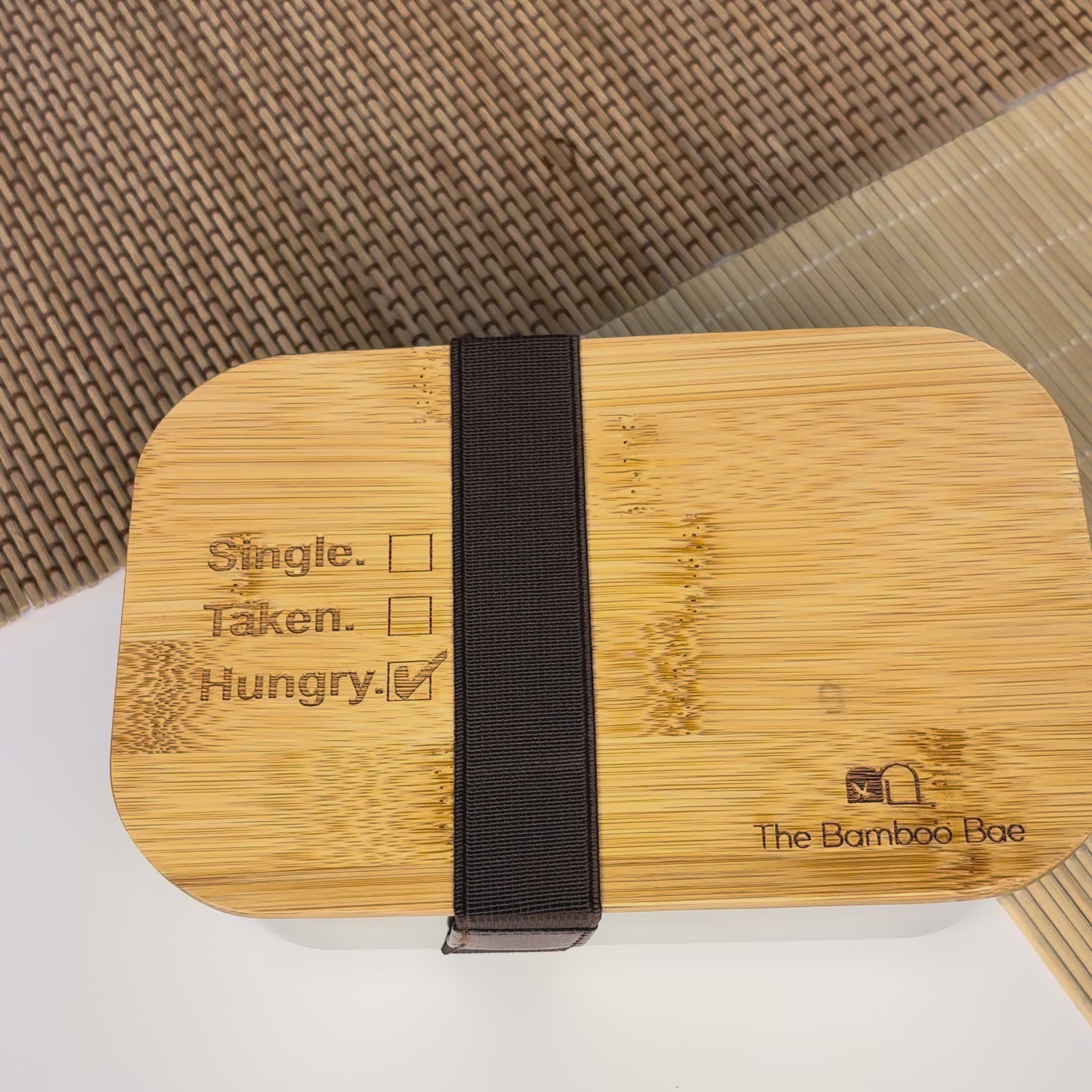 Eco-friendly bamboo lunch box – reusable wooden bento tiffin for meals and snacks.