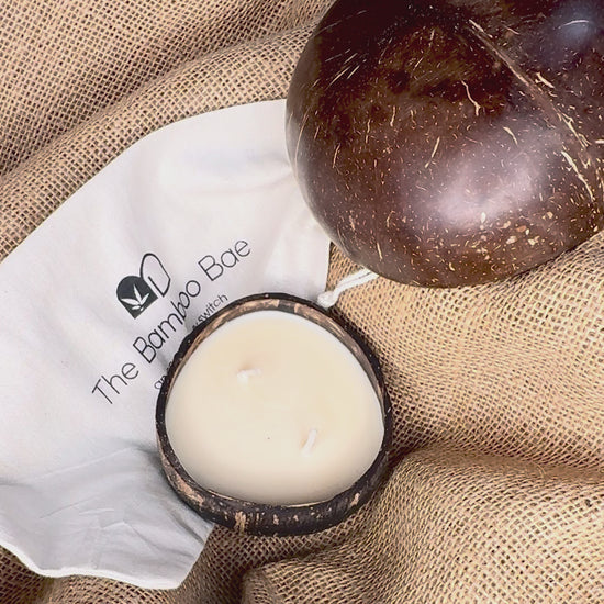 Eco-friendly coconut shell soy wax candle – sustainable handcrafted candle for corporate gifts and festive hampers.