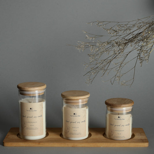 Set of 3 soy wax candles in borosilicate glass jars with bamboo lids – eco-friendly, reusable, and perfect for corporate or festive gifting.